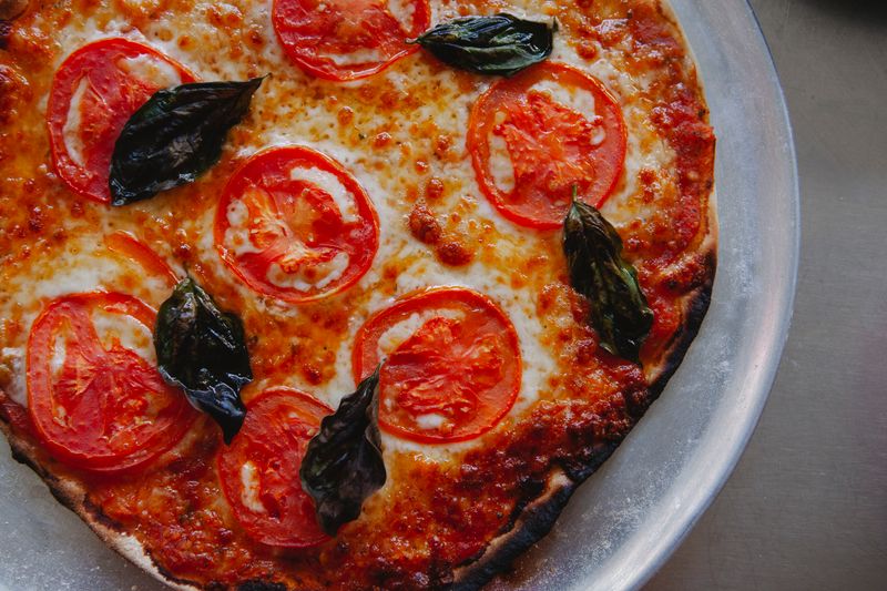 Papa Ginos pizza with fresh toppings